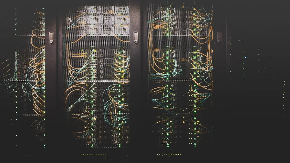 Server racks in a data centre, lit in blue ; the systems that underpin everything
